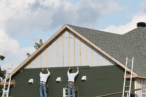 Professional Storm Damage Siding Repair technician working in Church Road, VA
